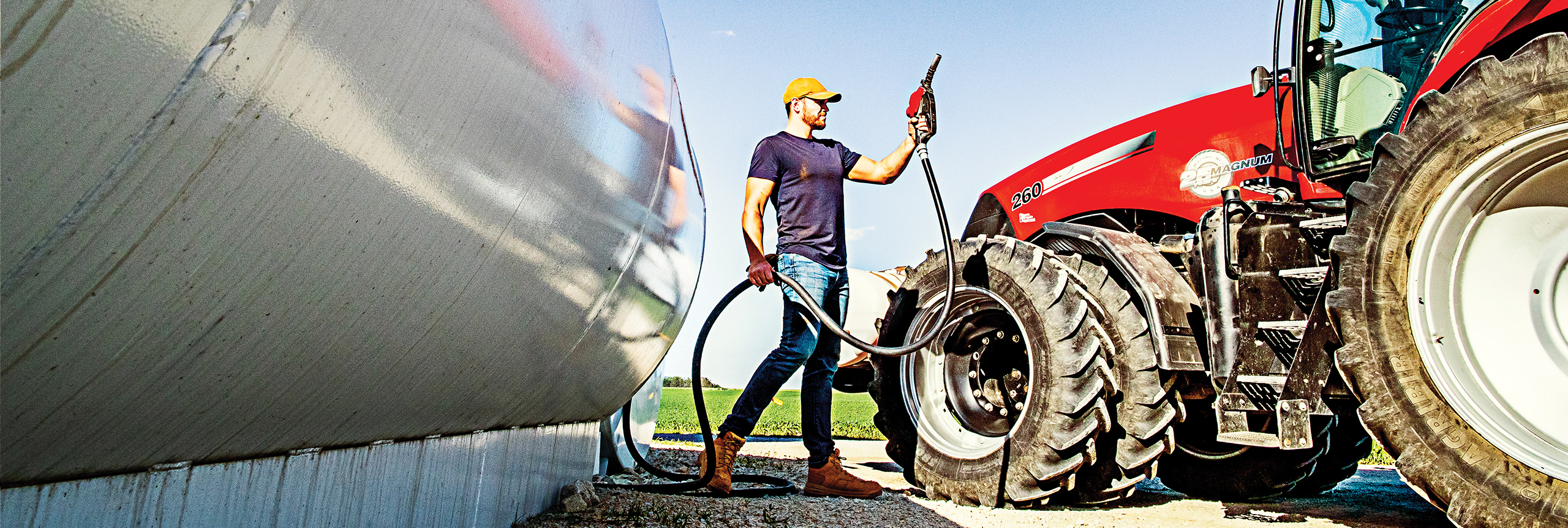 Fueling up farm tractor with Cenex premium diesel fuel.